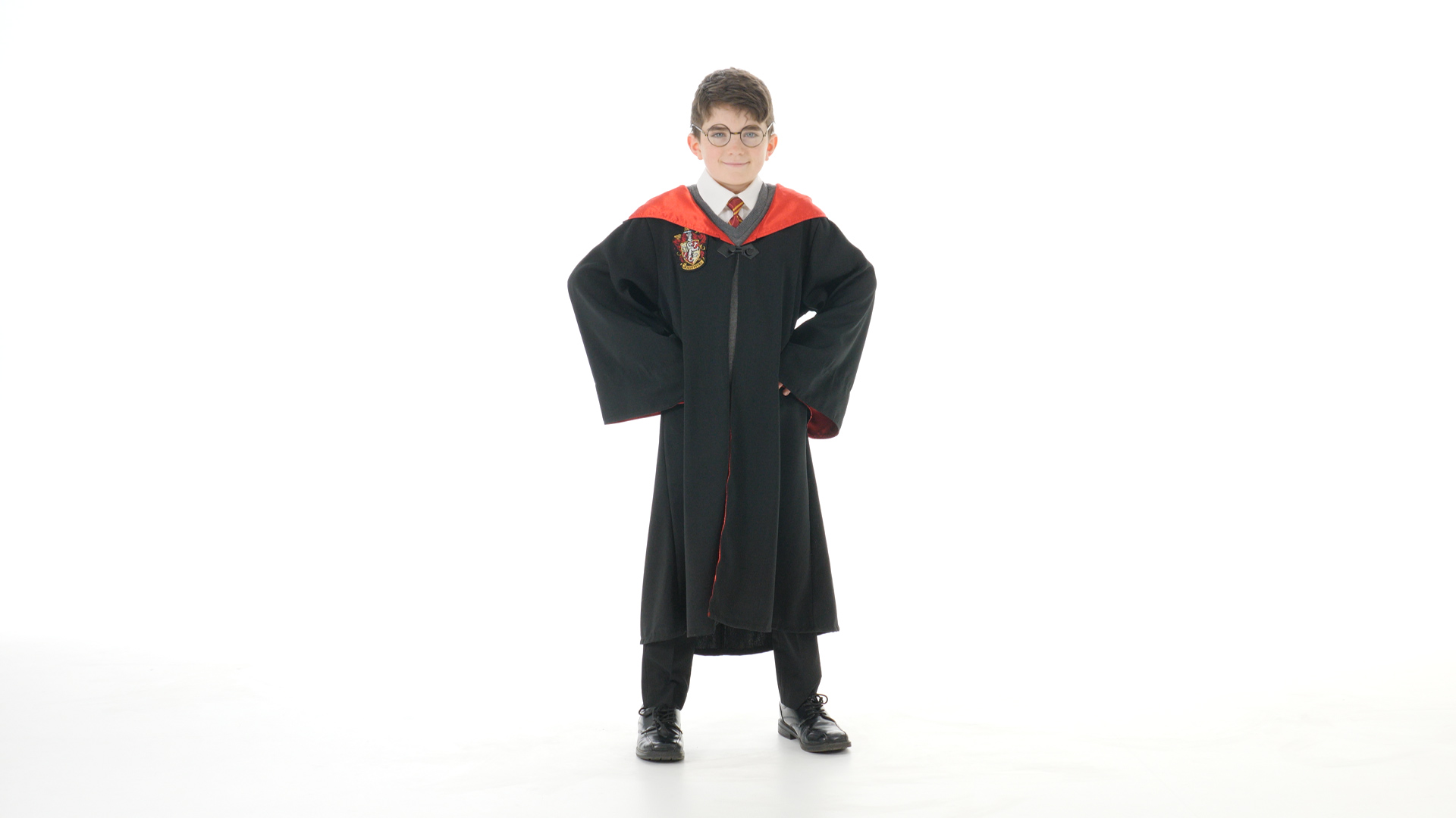 Become the wizard of wizards and learn to wield the mystery of magic in this Kid's Deluxe Harry Potter Costume! Save the day from you-know-who with the Deluxe Harry Potter Kid's Costume!